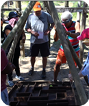 Hans directing his team blindfolded through a maze. Hans directing his team blindfolded through a maze.